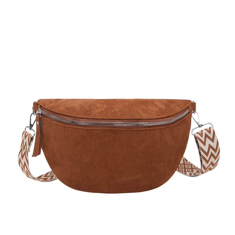 Brown suede fanny pack with a patterned strap on a white background