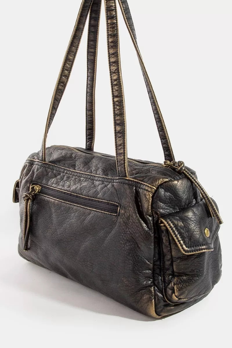 Black leather handbag with gold accents on a white background