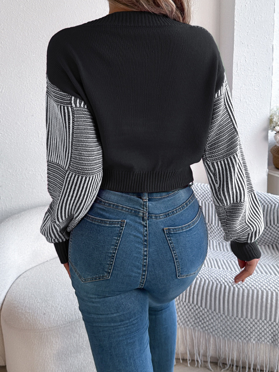 Black patchwork stripe V‑neck cropped sweater, back view — BUhmayzing