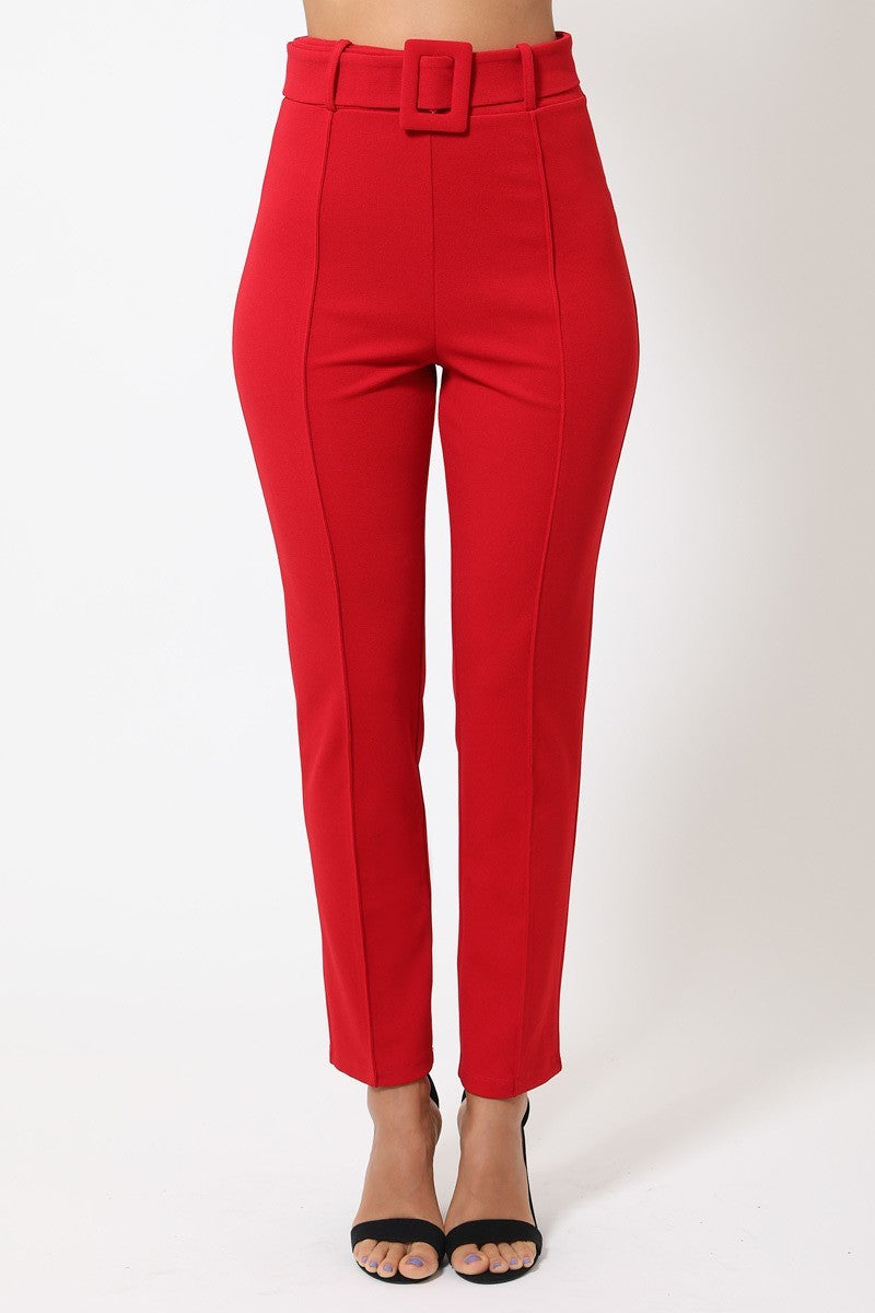 Red pants with a belt on a white background