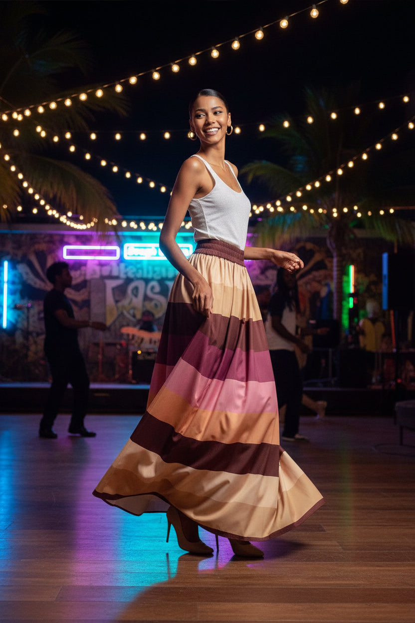 Woman wearing a long, striped skirt at a dancehall 