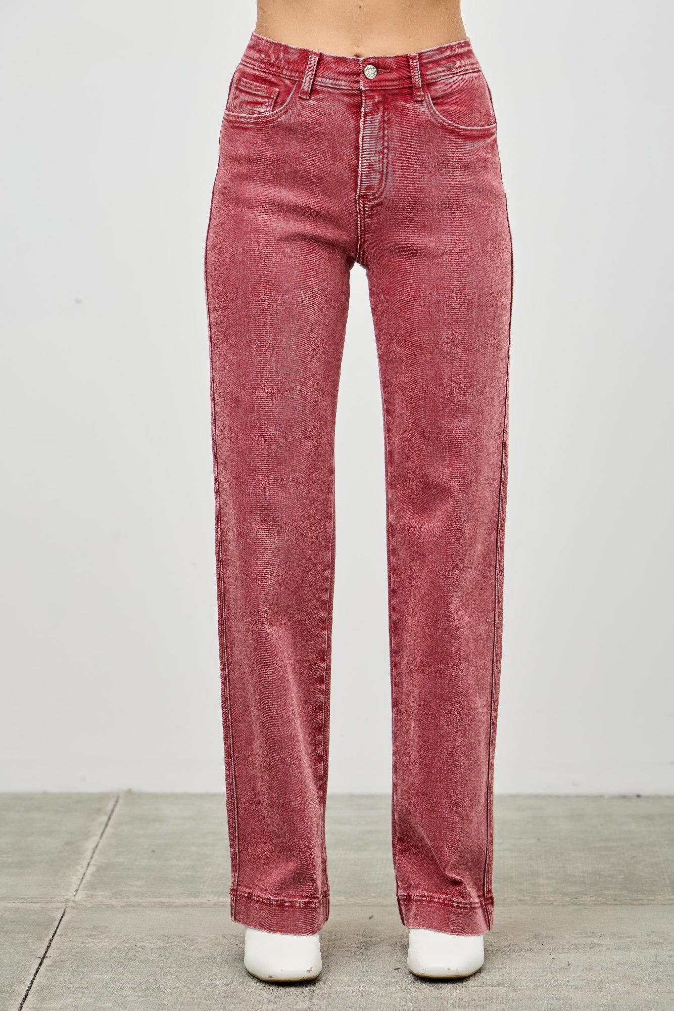 Red jeans on a plain background