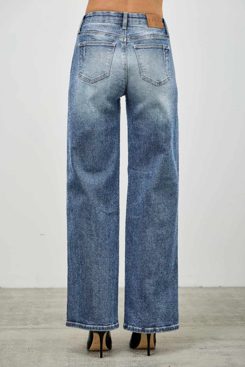 Pintuck Blue jeans worn by a model back view