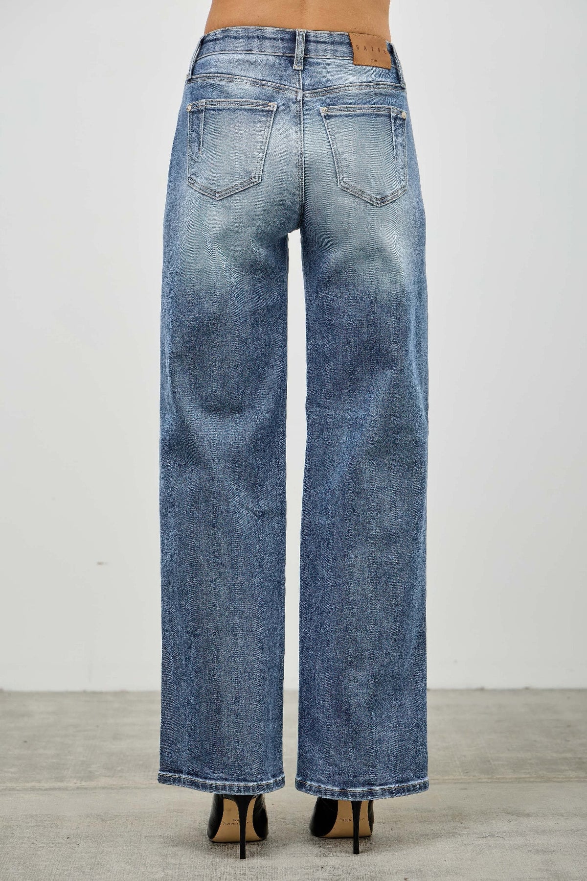 Pintuck Blue jeans worn by a model back view