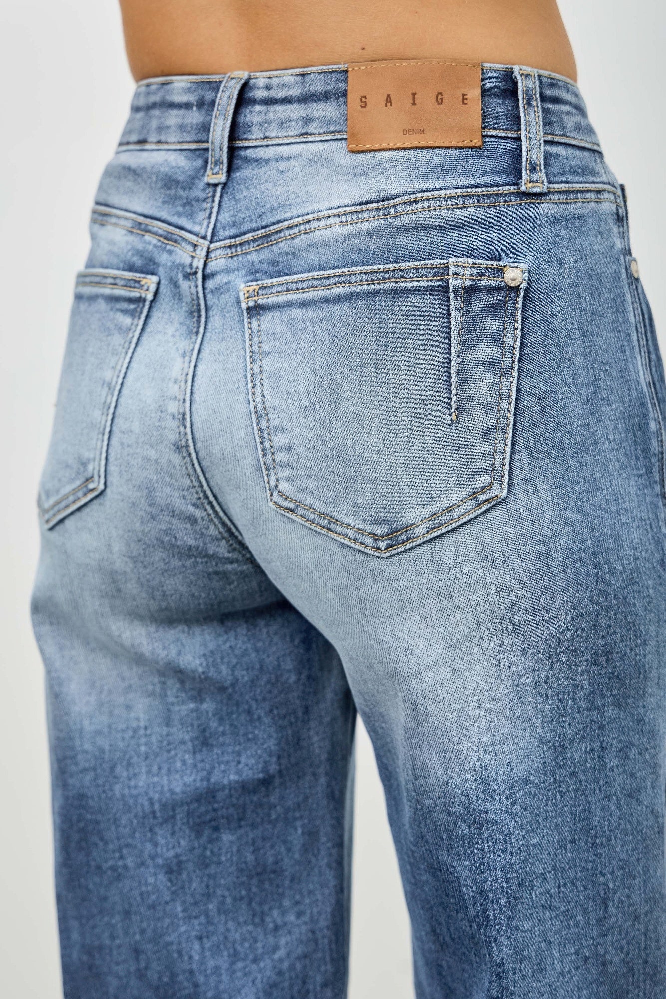 Pintuck Blue jeans butt view 