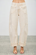 Beige Western barrel jeans worn by a model