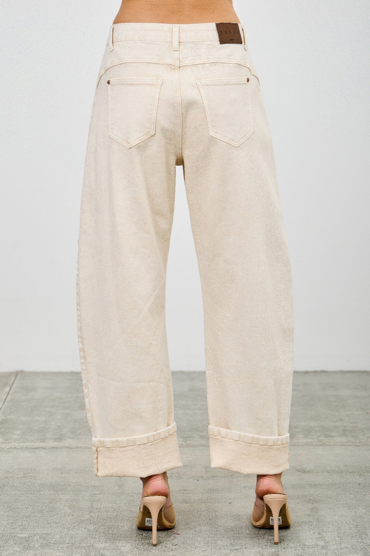 Beige western barrel jeans back view