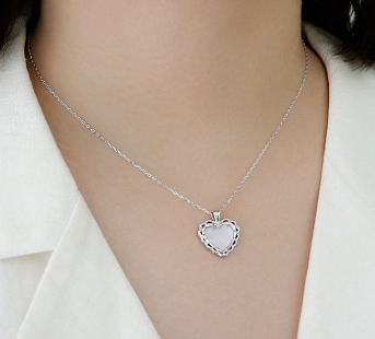 Model wearing Mother of Shell Heart 925 Sterling Silver Necklace "rhodium plated"