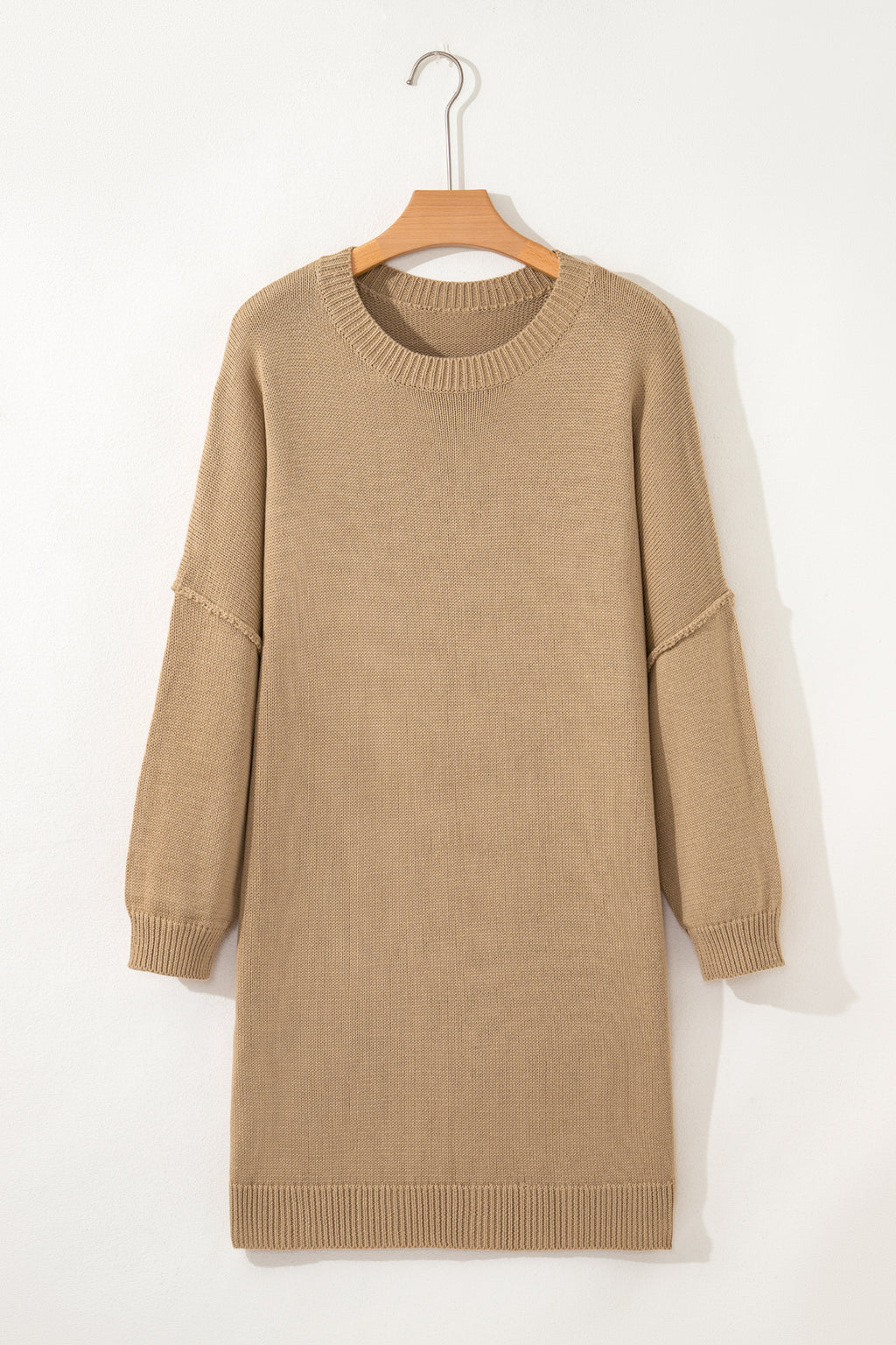 Women's Khaki Exposed Seam Mini Sweater Dress on a hanger front view