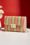 Colorful striped handbag on a red background