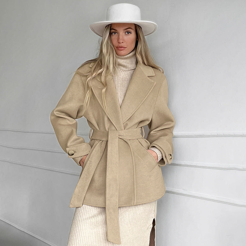 This Retro Khaki Womens Suit Collar Trench Coat exudes timeless style and elegance. Featuring a lightweight, khaki cotton blend fabric, it is tailored to perfection for a classic look. It's flattering double-breasted structure and optional belt provide a feminine touch. Let this timeless piece inspire you to make a bold fashion statement.