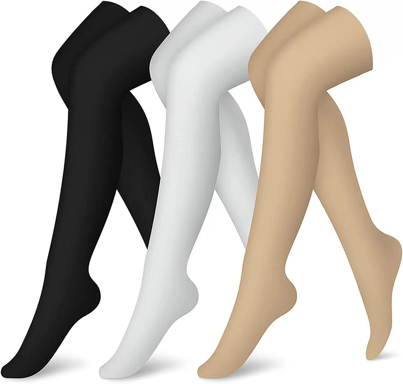 Black, white, and beige tights on a white background
