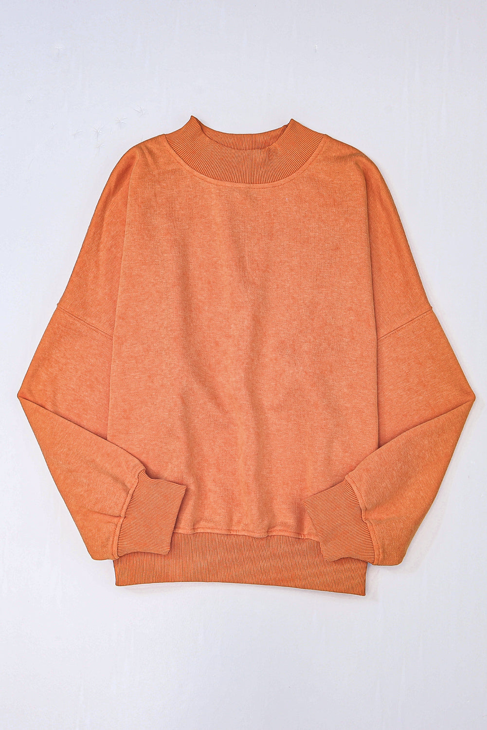 Orange sweatshirt on a white background