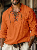 Model wearing a Men's Heritage Lace-Up Henley Long Sleeve Shirt orange
