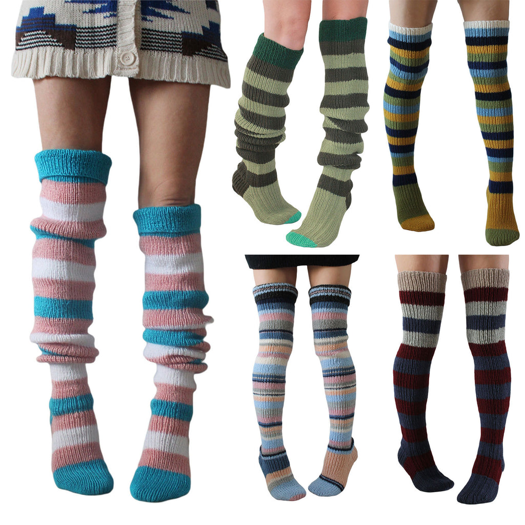 Collection of colorful striped knee-high socks on a white background