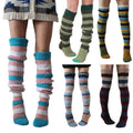 Collection of colorful striped knee-high socks on a white background