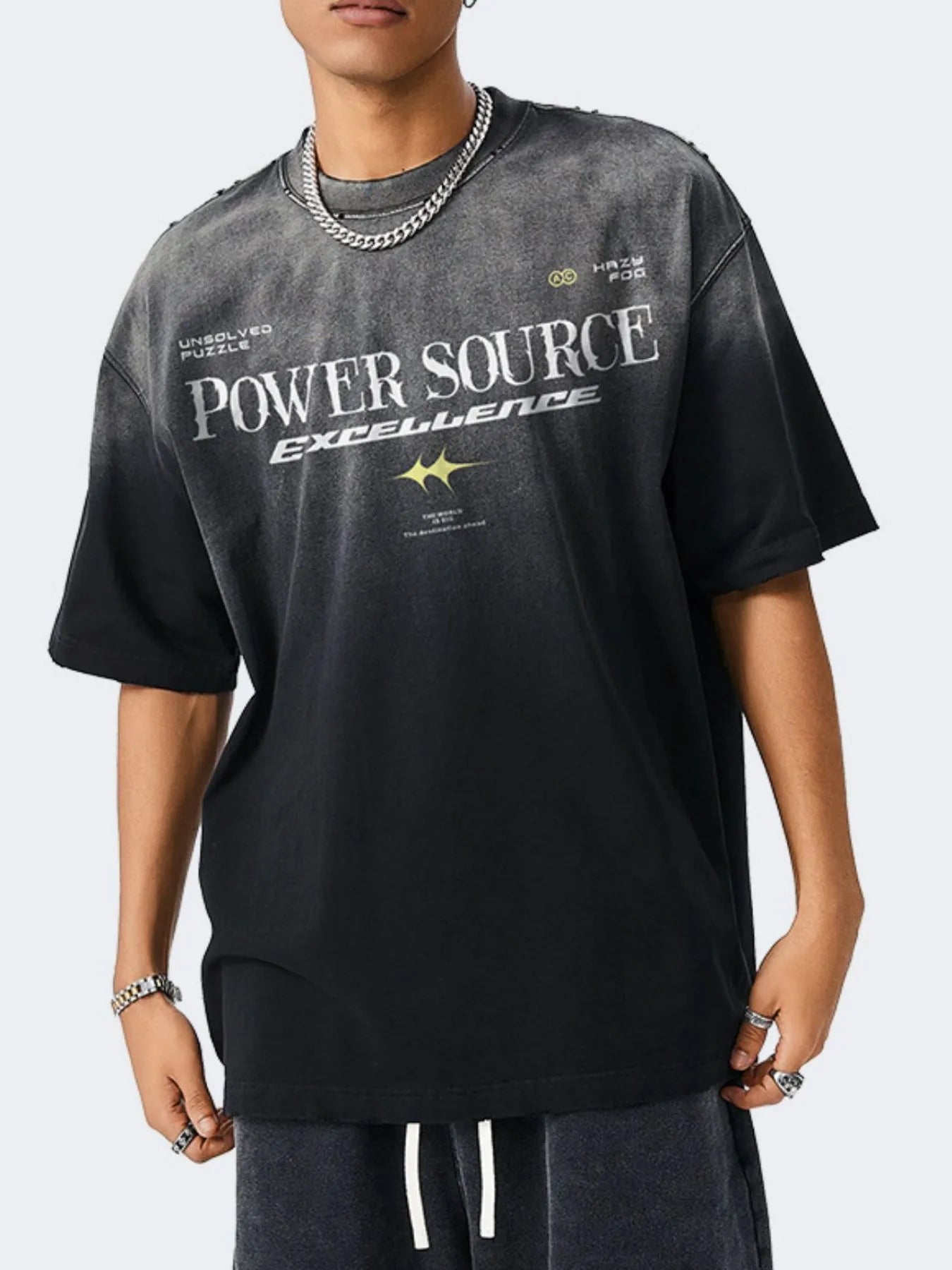 Male model wearing a black Men's "Power Source Excellent" Graphic Short Sleeve T-Shirt