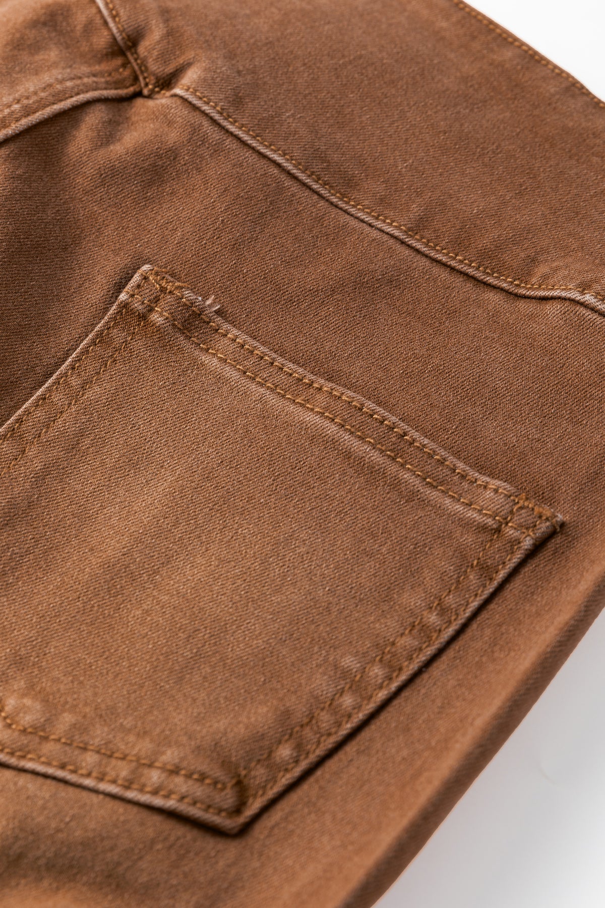 Close-up of aWomen's Vintage Copper High-Waist Jeans pocket 