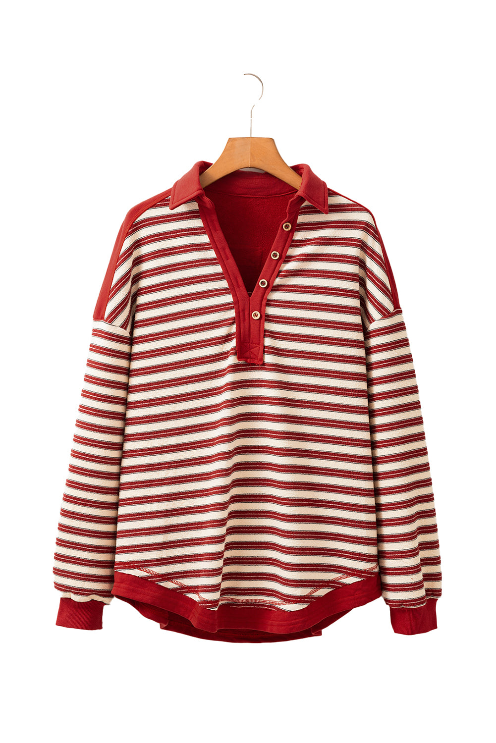 Red and white striped shirt on a hanger against a white background