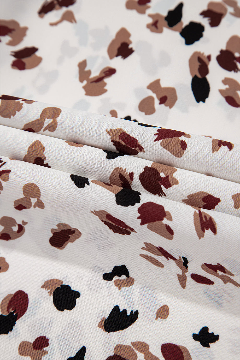 Close-up of fabric with abstract pattern on a white background