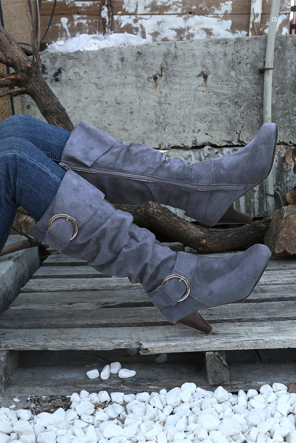 Gray suede knee-high boots with gold buckles 