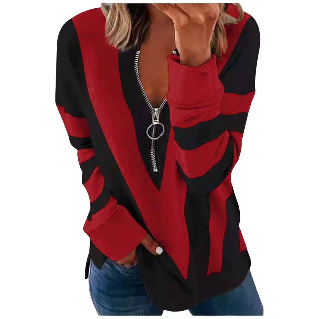 Red and black zip-up hoodie worn by a person on a white background
