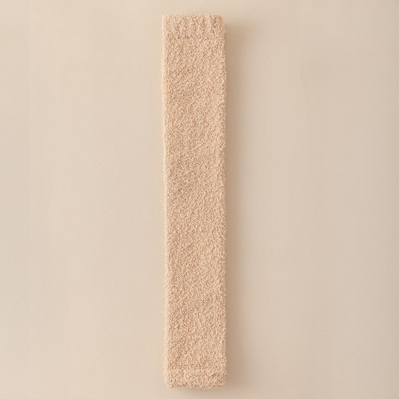 Rectangular block with textured surface on a beige background