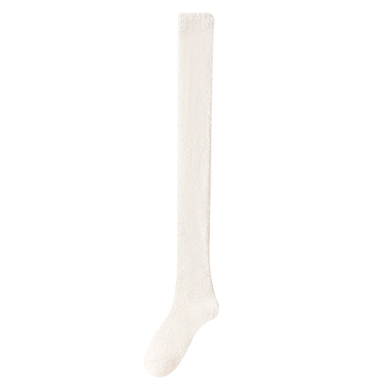White knee-high sock on a white background