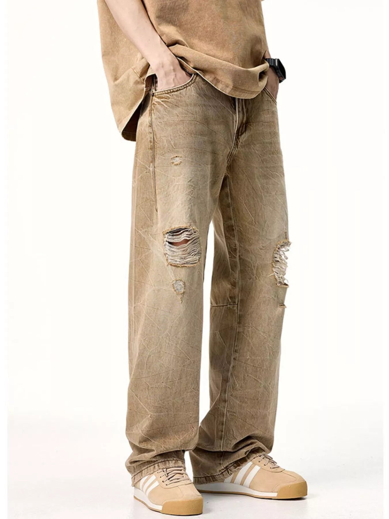 Male model wearing a pair of Men's Camel Brown Distressed Relaxed Fit Jeans right view