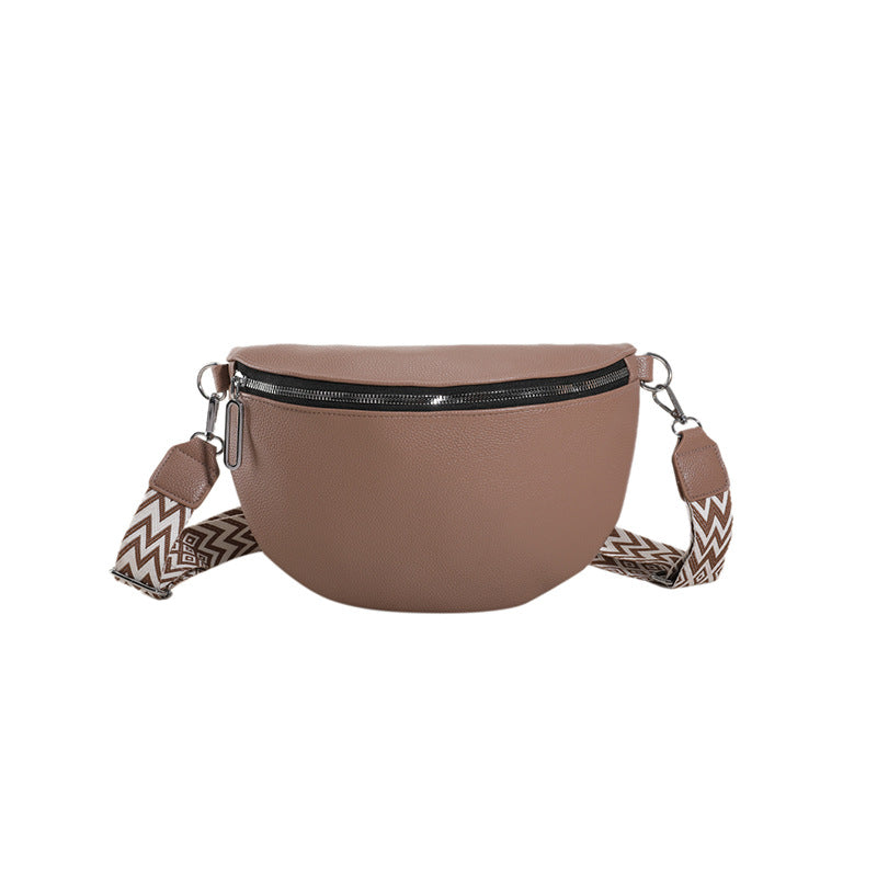 Brown fanny pack with a patterned strap on a white background