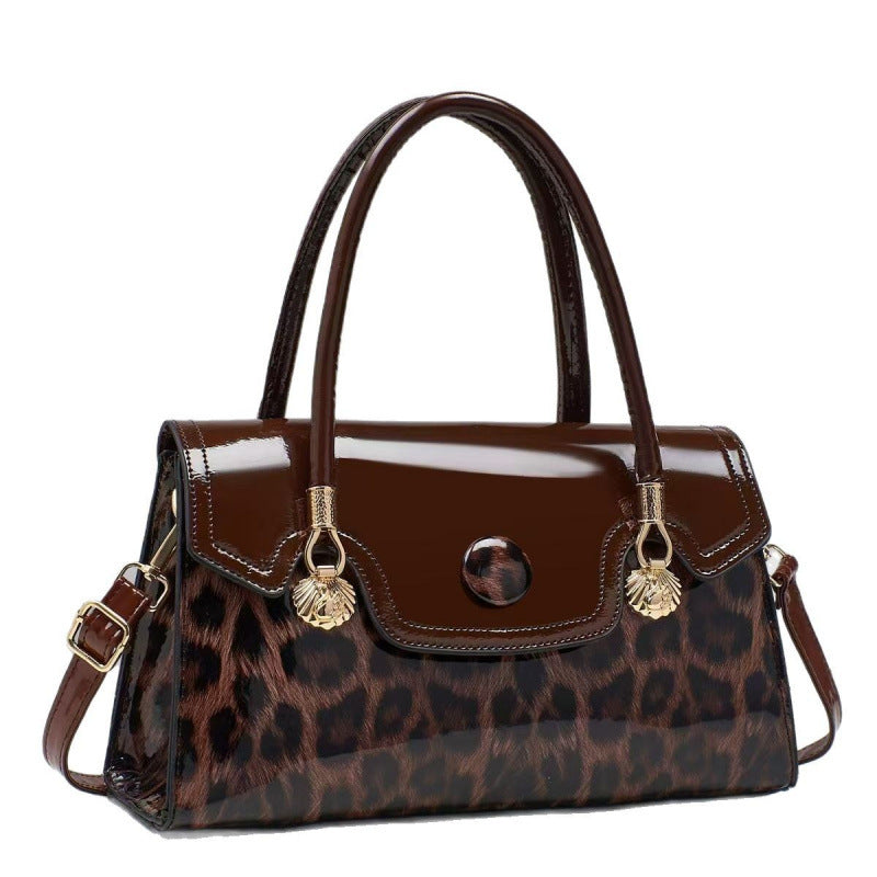 Brown handbag with leopard print pattern on a white background