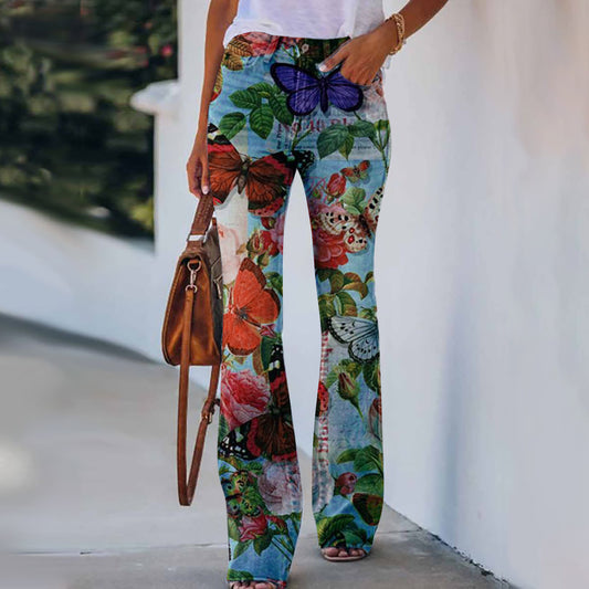 Add a splash of color and nature to your wardrobe with our Women's Summer Flower-bird Print Trousers. These vibrant trousers feature a unique print of flowers and birds, perfect for brightening up any summer outfit. Stay stylish and comfortable all season long.