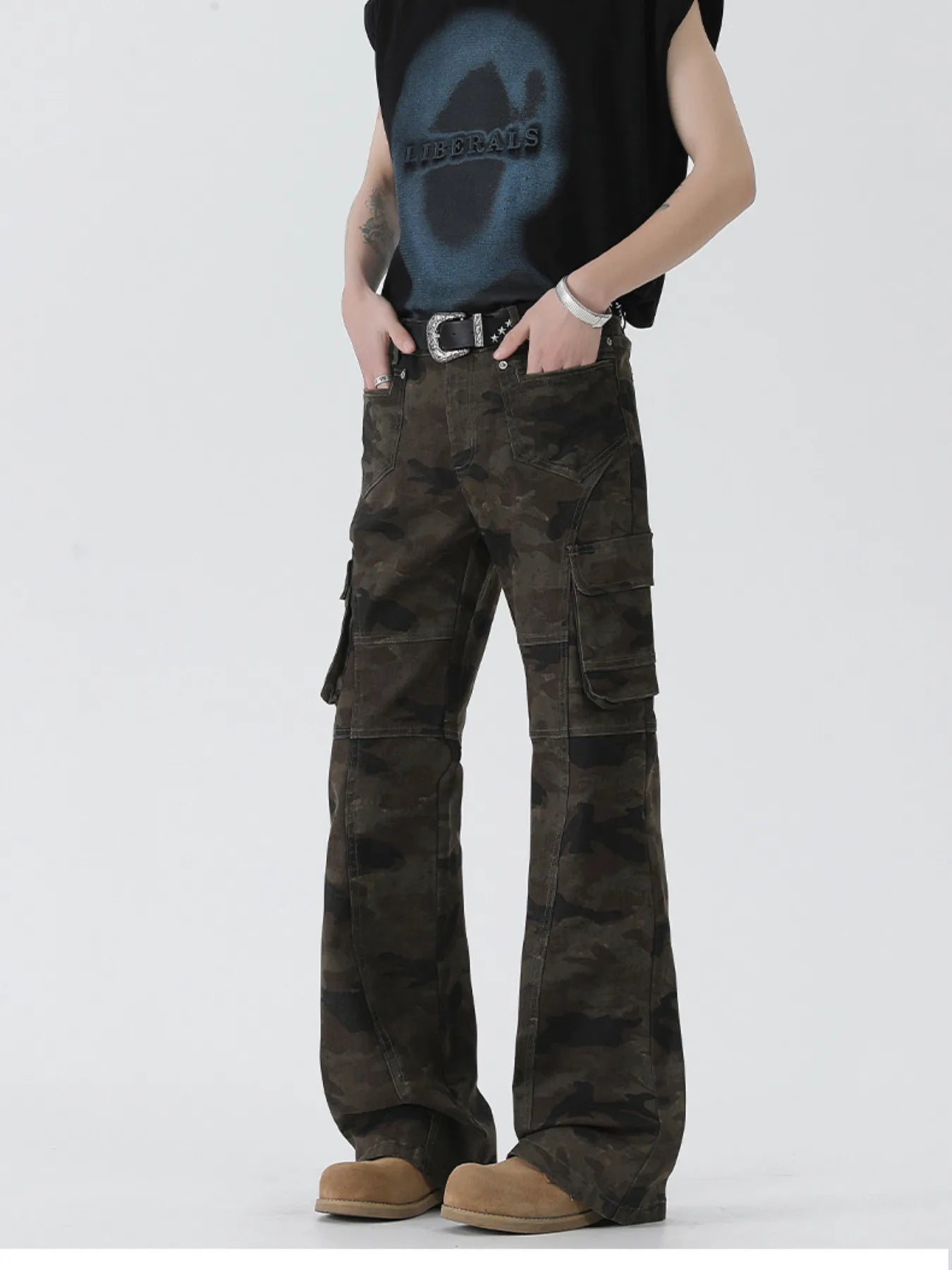 Model wearing Men's Camo Cargo Flare Jeans