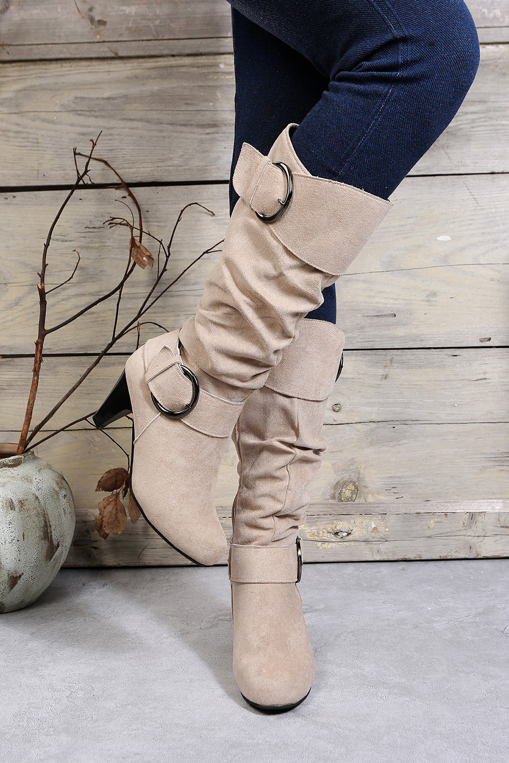 Beige knee-high boots with decorative buckles 