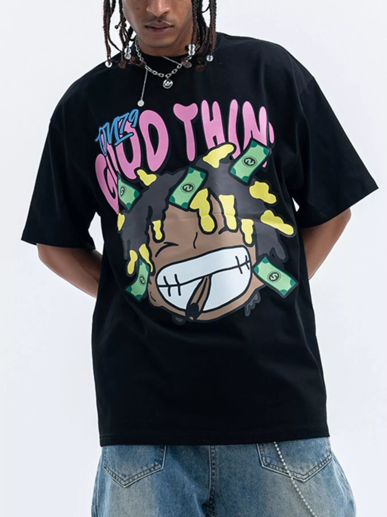 Model wearing a black fierceguy "Good Thing" graphic t-shirt