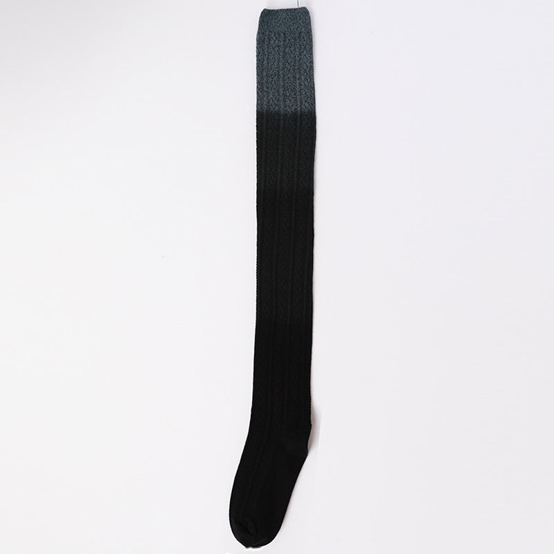 Black sock with gray top on a white background