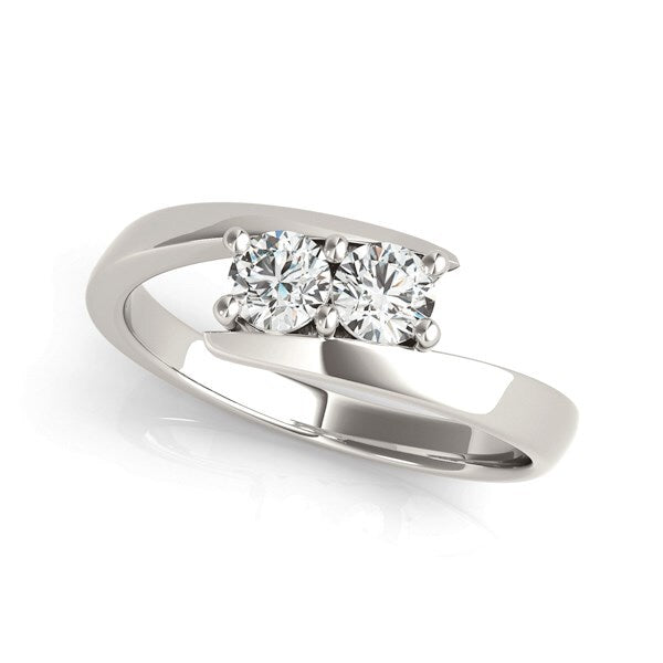 A simple and elegant prong two stone diamond women's ring is the perfect way to symbolize your special union together made of 14k white gold. Crafted with 14k white gold, this timeless two-stone diamond ring is a refined reminder of your commitment, boasting a sophisticated .46 carat weight.