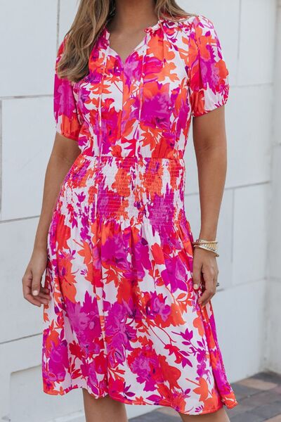 Step into style with our Women's Chic Smocked Vibrant Printed Tie Neck Dress. Embrace a trendy look with vibrant prints and a flattering smocked design. The tie neck adds a touch of sophistication to this fashionable dress. Elevate your wardrobe with this chic ensemble that seamlessly combines style and comfort.