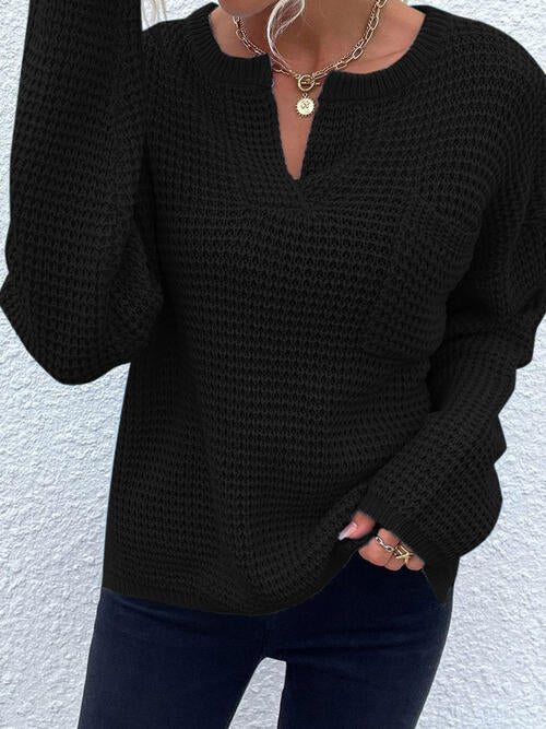 A model wearing a Women's Trendy Black Posh Modern Notched Neckline Sweater