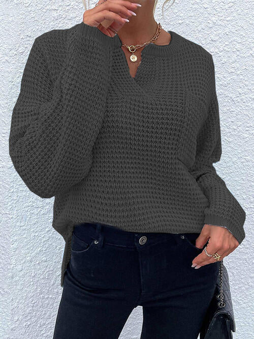 A model wearing a Women's Trendy Charcoal Posh Modern Notched Neckline Sweater