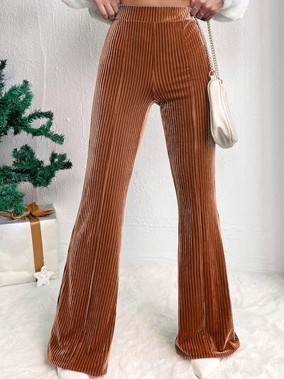 Step back in time with a modern twist in our Women's Caramel Color Ribbed Bootcut Pants! Inspired by the iconic styles of the 70s and 80s, these pants are a must-have throwback piece for your wardrobe. Crafted with a ribbed texture and a flattering bootcut silhouette, they offer both style and comfort.