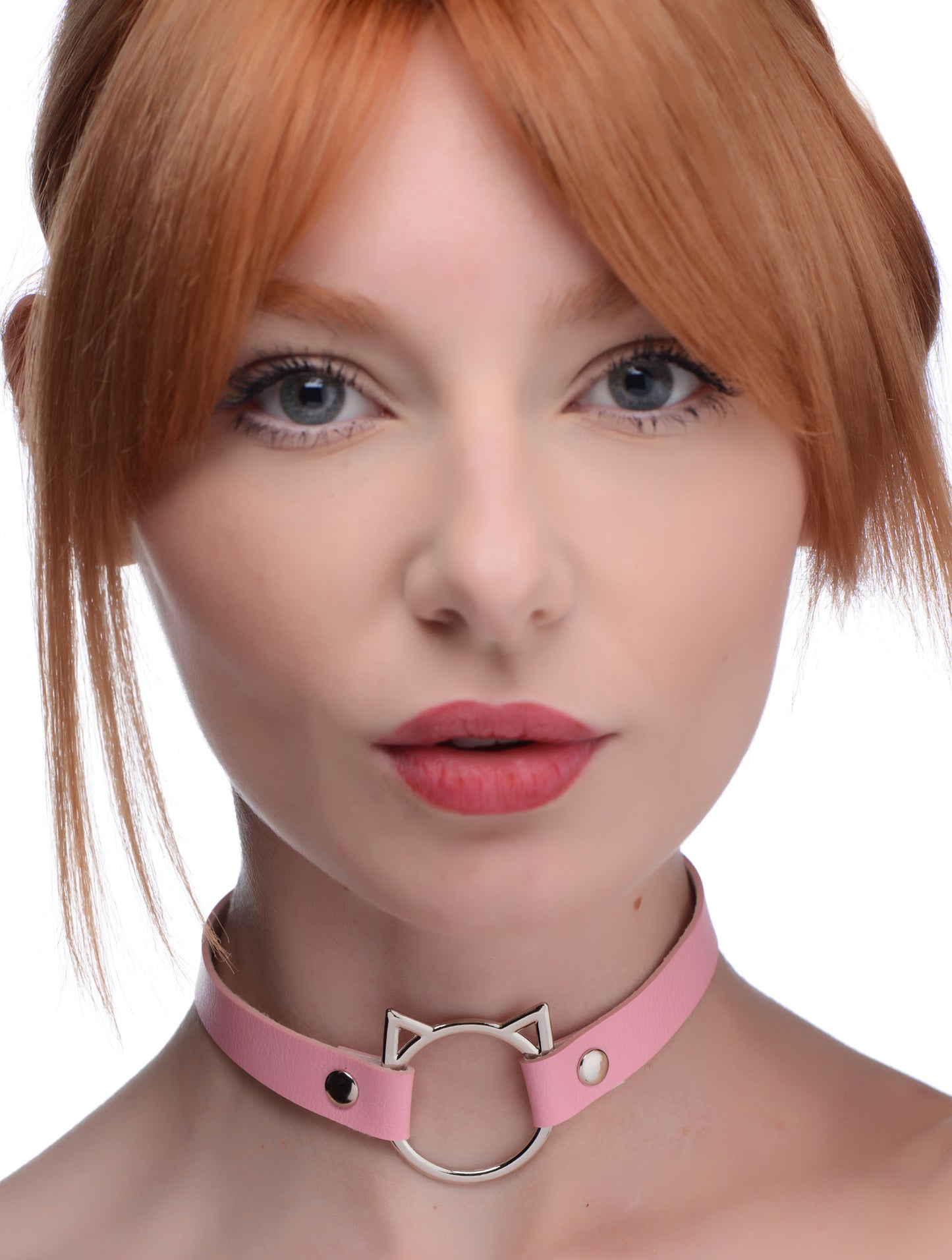 This slim and naughty Kinky Kitty Ring Choker is sure to bring out your wild side. Adjust the snap buttons for the purrrfect fit and enjoy the lightweight PU leather material that feels soft on the skin. The nickel-free metal hardware is tough enough to withstand light pulls and the slim band adds a subtle but delicious BDSM touch. 