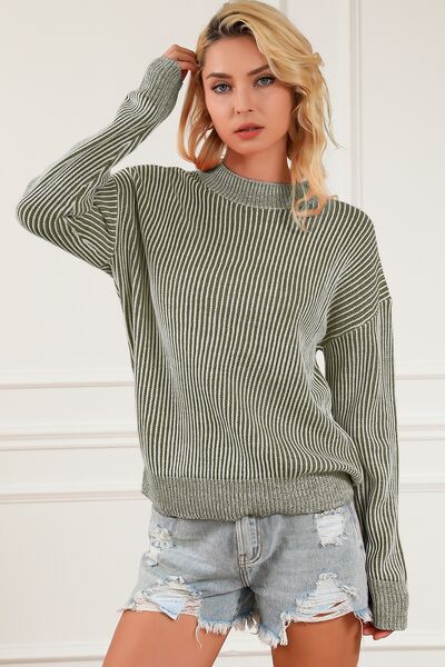 Model wearing a Sage Ladies Fashionable Striped Mock Neck Dropped Shoulder Sweater