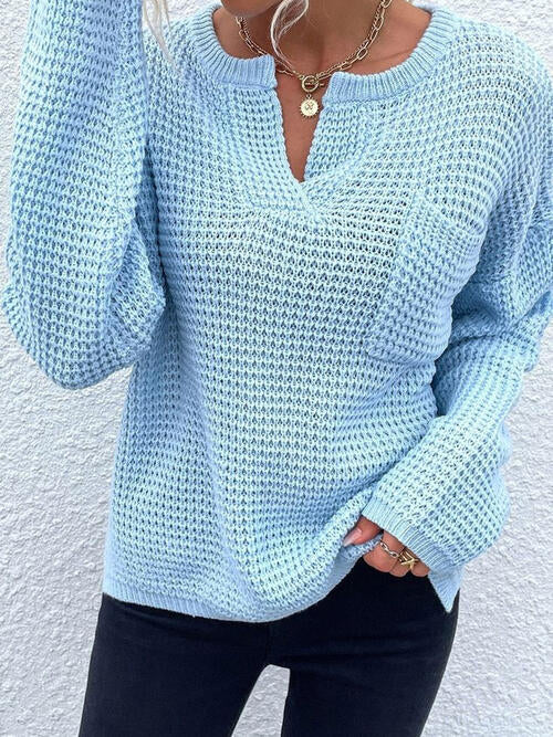 A model wearing a Pastel Blue Women's Trendy Posh Modern Notched Neckline Sweater