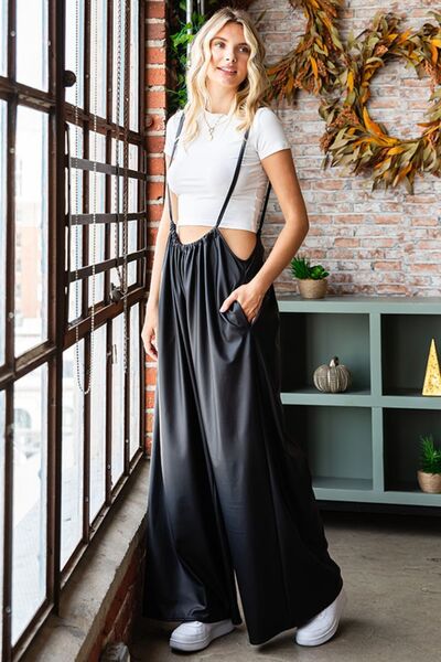 Discover the ultimate in feminine style with our Women's First Love Drawstring Spaghetti Strap Wide Leg Overall. Embrace comfort and fashion with our chic spaghetti strap design and flattering wide-leg silhouette. Perfect for any occasion, these overalls are your go-to choice for effortless elegance. Shop now and experience your first love in fashion!