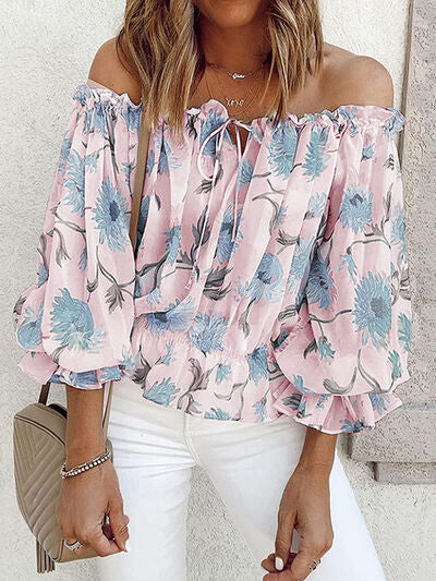 Stay fashion-forward with our Ladies Elegant Floral Off-Shoulder Flounce Blouse. Featuring a beautiful floral design and off-shoulder flounce style, this blouse is both elegant and trendy. Perfect for any occasion, it will make you stand out and feel confident. Upgrade your wardrobe with this must-have piece.