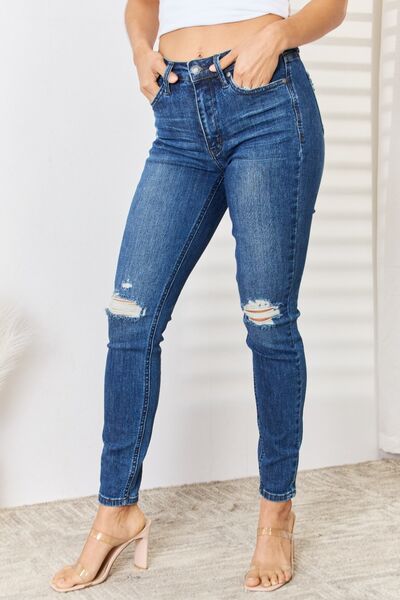 Get ready to rock your world with these Judy Blue Women's High Waist Distressed Slim Jeans! They're not just jeans, they're a fashion statement! With their high waist design, they'll hug your curves in all the right places, giving you that sleek and sassy silhouette you've been dreaming of.